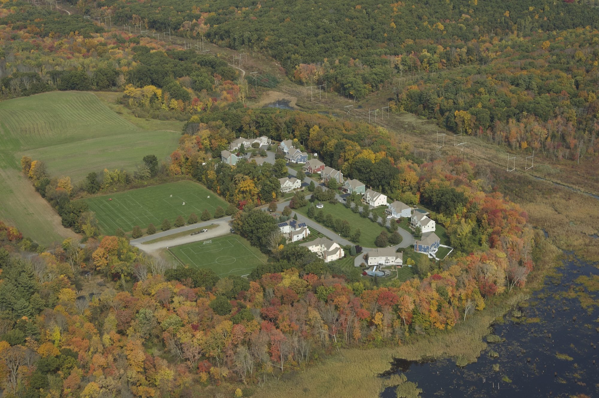 A Zendko community at the edge of preserved farmland and woodlands