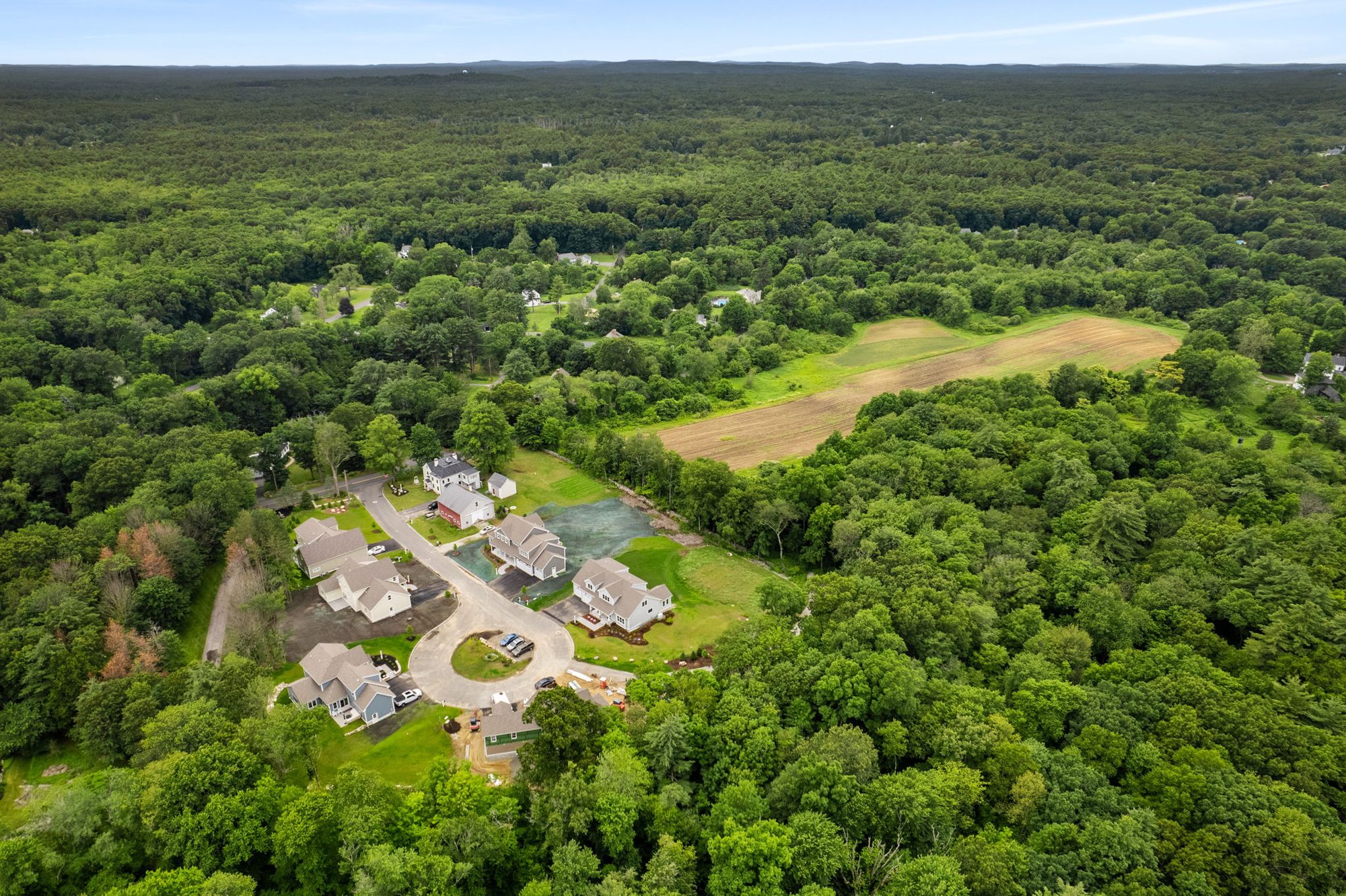 Aerial showing community and surrounding fields
